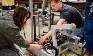 FRC students work on robot