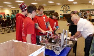 FTC students work on robot